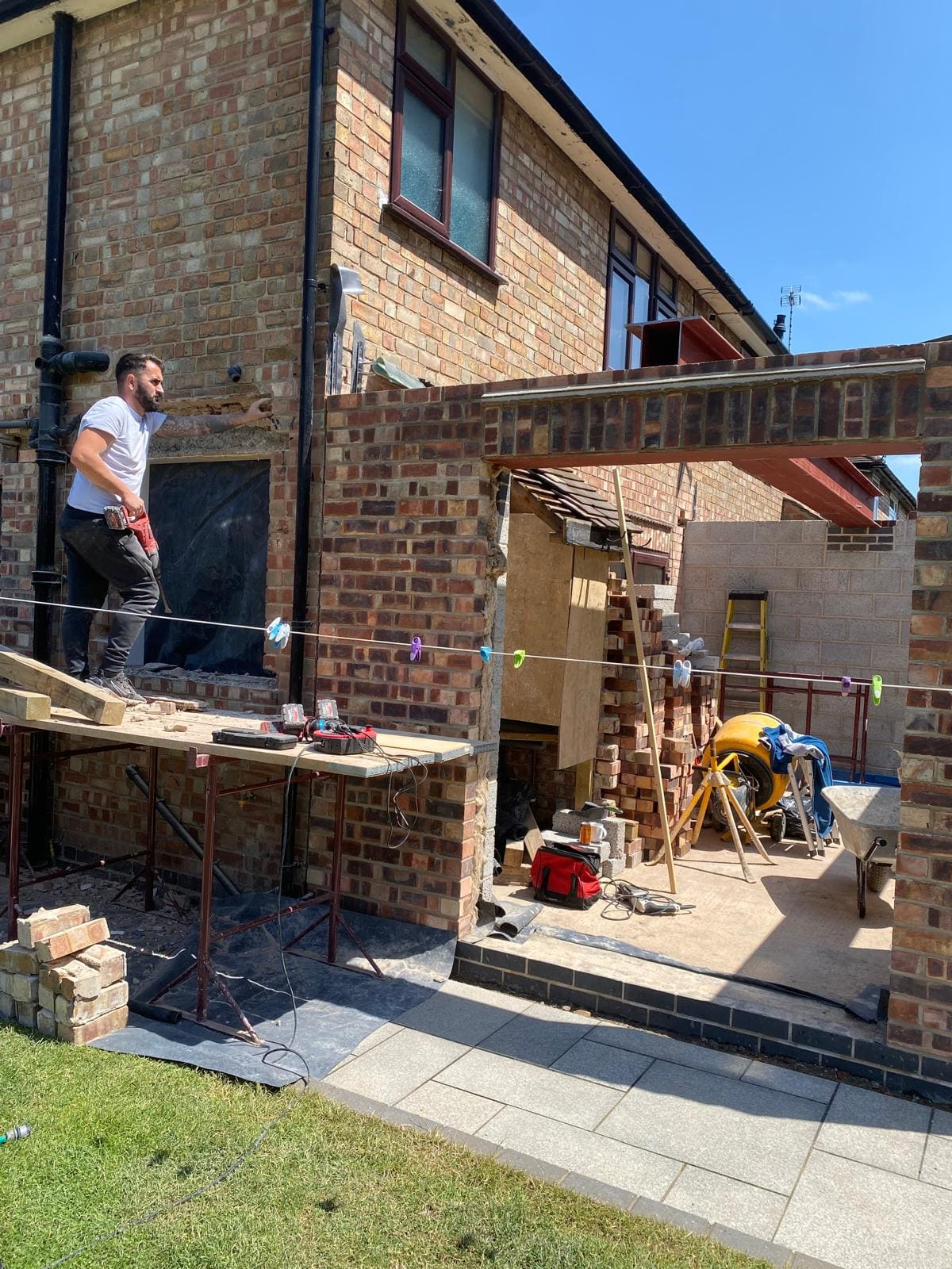 Steel beam bridging a new opening in reclaimed brickwork