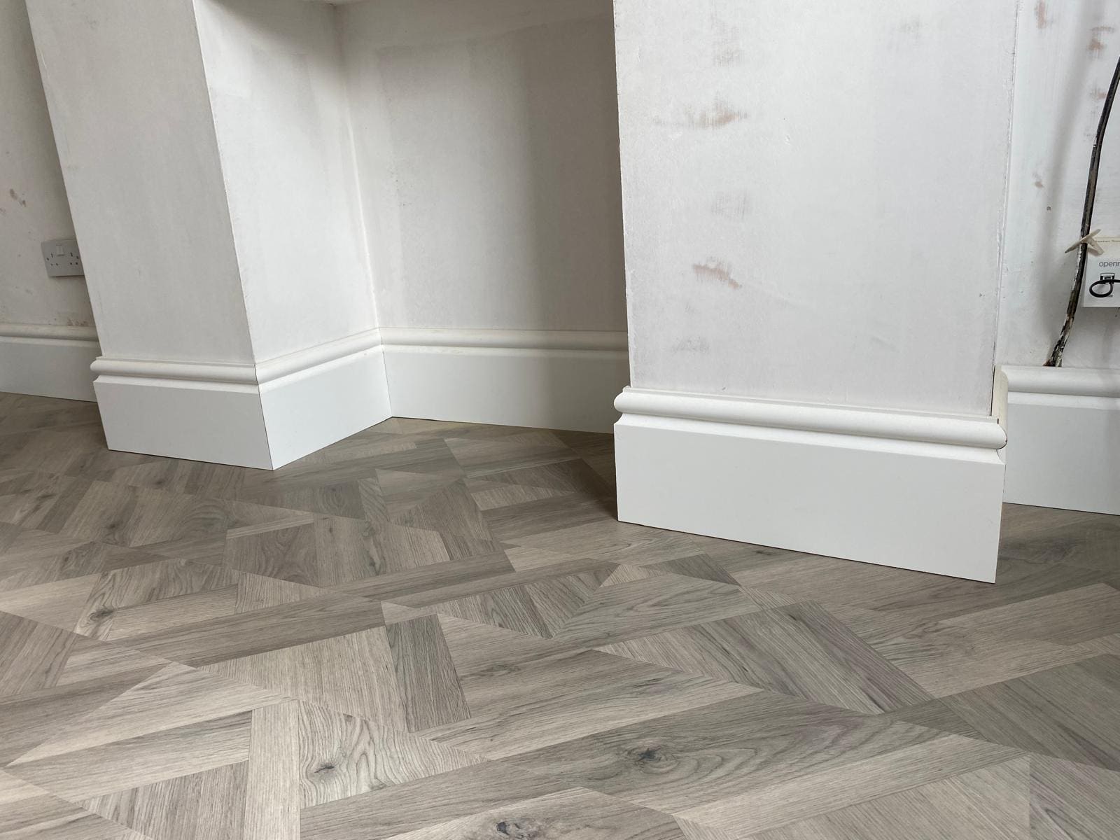 New ogee skirting boards over parquet flooring